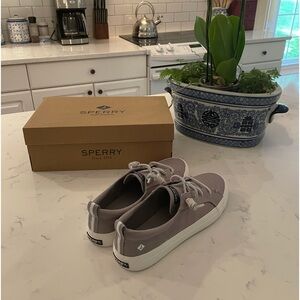 Cute slip on Sperry boat shoes. Never worn.